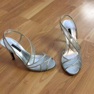 CAPARROS silver high heels